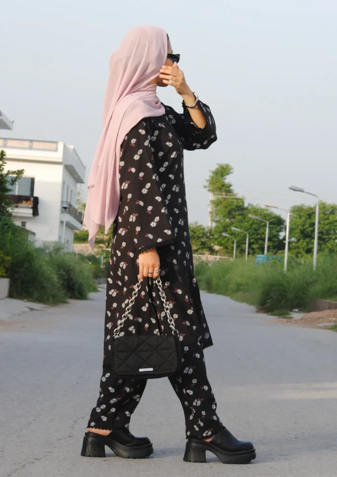 Black flowers by Sakina