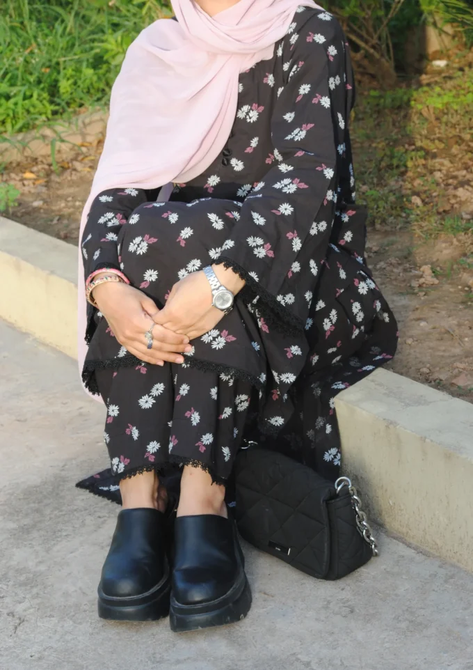 Black flowers by Sakina